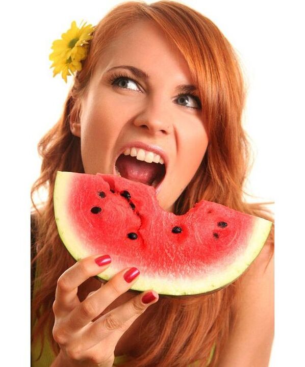 girl eating watermelon in watermelon diet